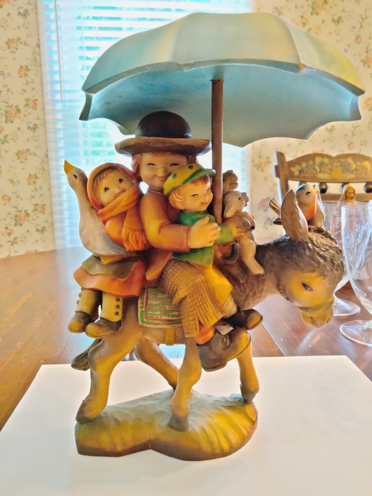 A-054 Children on Donkey w/ Umbrella image 1